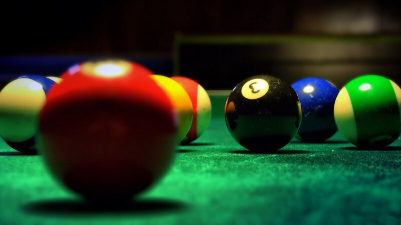 Pool Balls on Green Felt — Dramatic