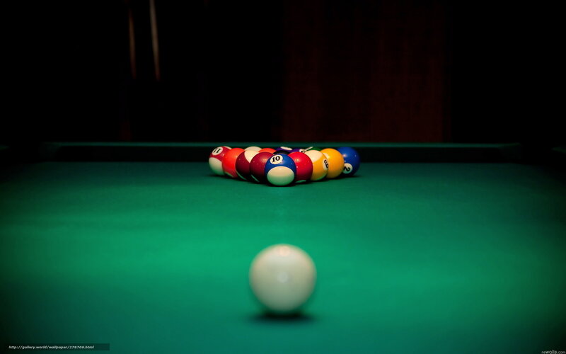Pool balls on green table