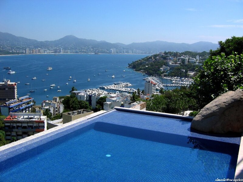 Pool overlooking coastal city