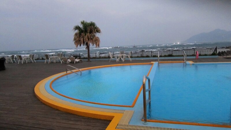 Pool Overlooking Ocean — Blue, Calm