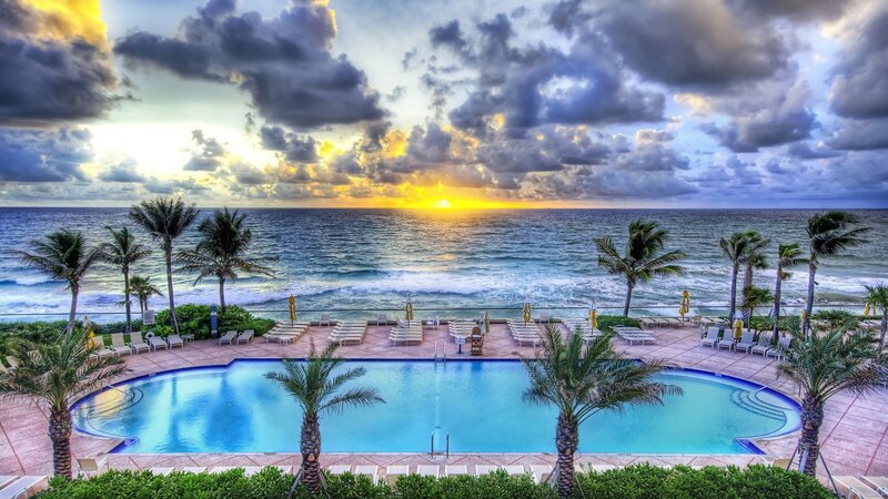 pool overlooking ocean sunset