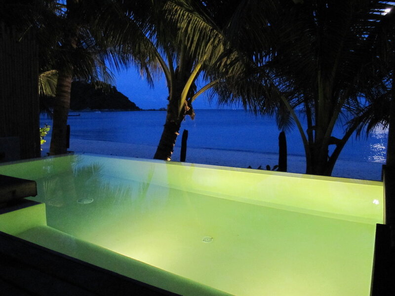 pool overlooking the ocean at night