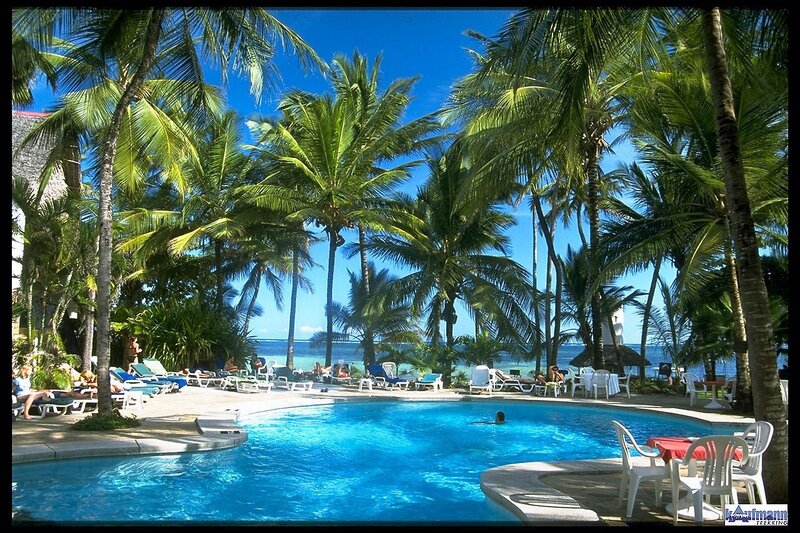 Pool Surrounded by Palm Trees — Blue, Relaxed