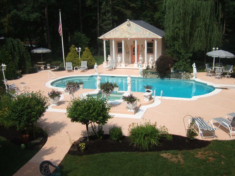 pool with garden and pavilion