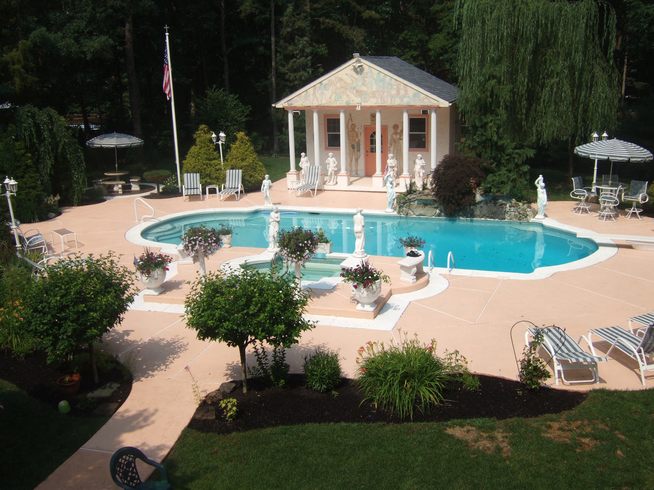 pool with garden and pavilion