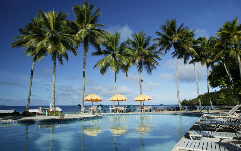 Pool with Palm Trees — Blue, Serene, Afternoon, Photograph, Umbrellas