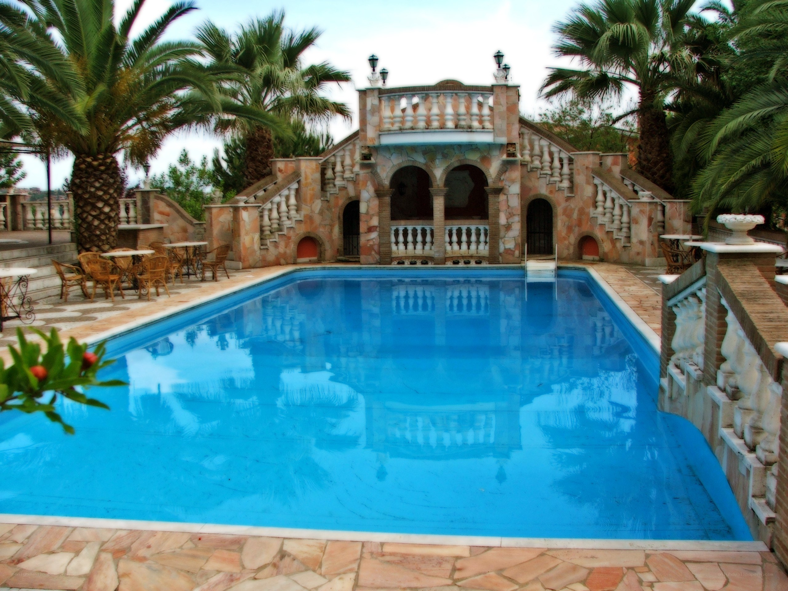 pool with stone architecture