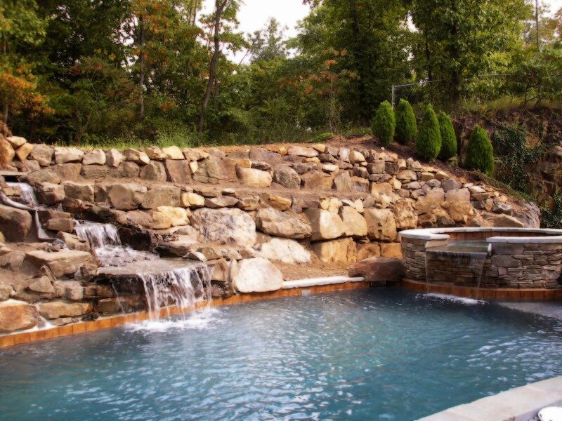 Pool with waterfall feature