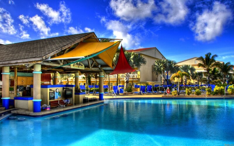 Poolside Bar and Lounge — Blue, Relaxed, Afternoon, Photograph, Lounge Chairs