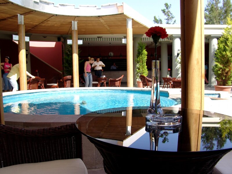 Poolside Lounge Area — Blue, Relaxed, Afternoon, Photograph, Table