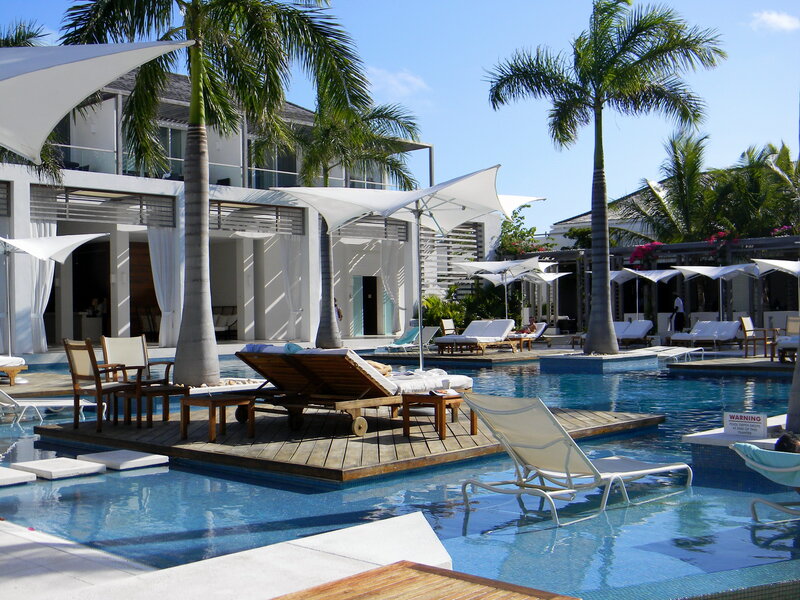 Poolside Lounge Area — Blue, Relaxed, Afternoon, Photograph