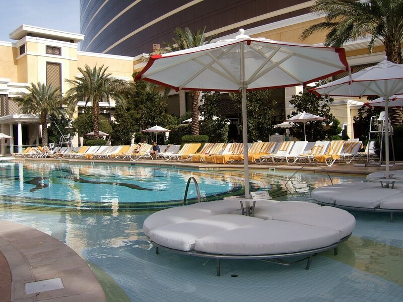 Poolside Lounge Area — Blue, Relaxed, Afternoon, Photograph, Umbrellas