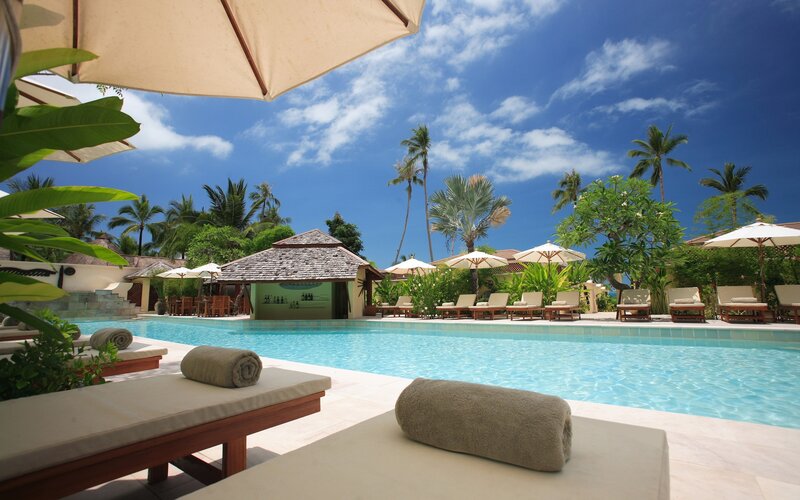 Poolside Lounge Area — Blue, Serene, Afternoon, Photograph, Umbrellas, Towels