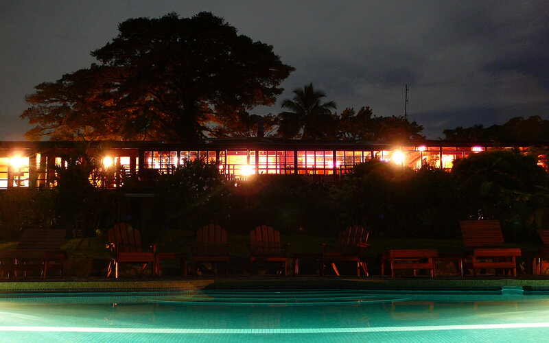 Poolside Lounge Chairs — Blue, Serene, Night, Photograph