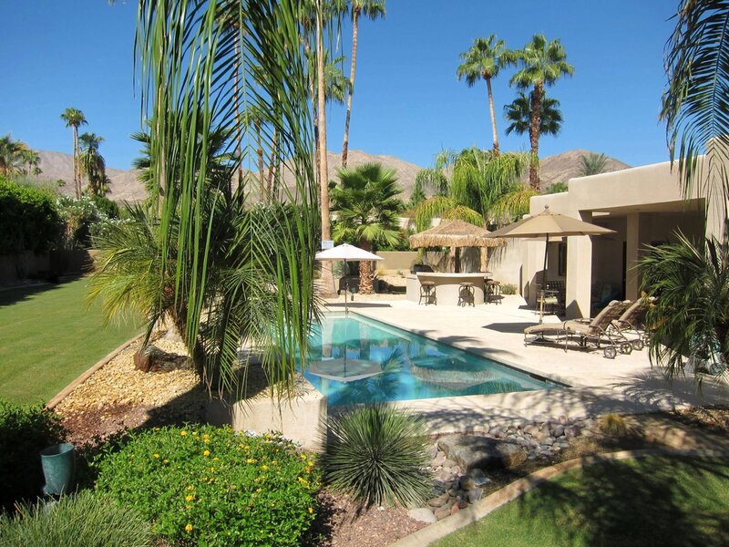 Poolside Patio with Palm Trees