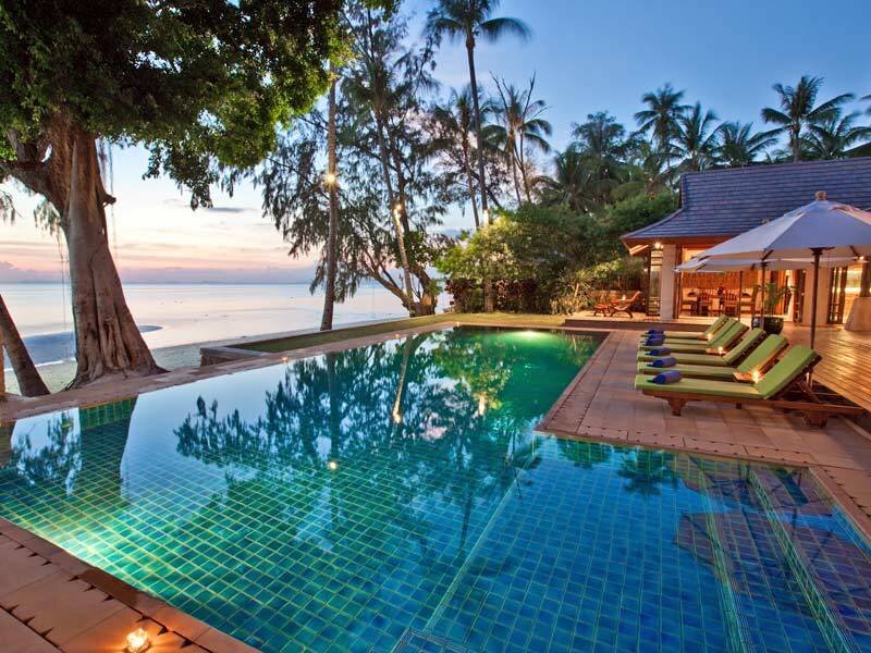 Poolside resort at sunset