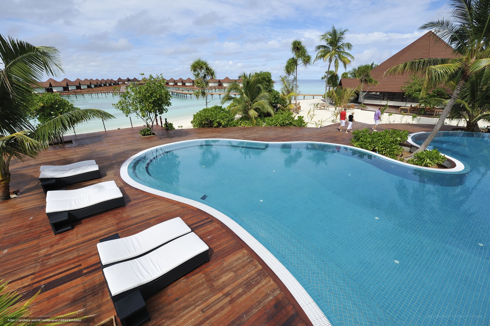 Poolside resort with beach view