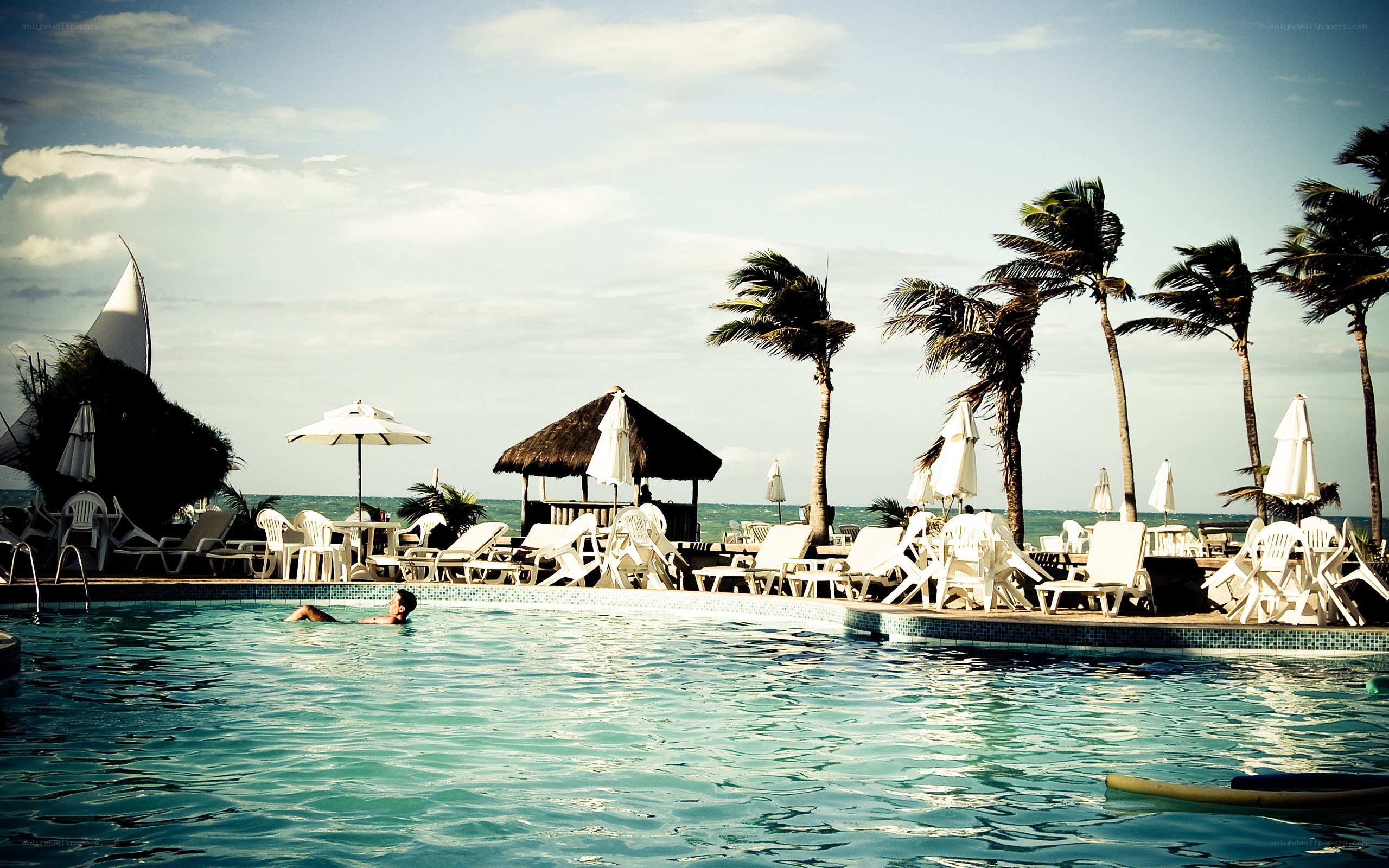 Poolside resort with ocean view