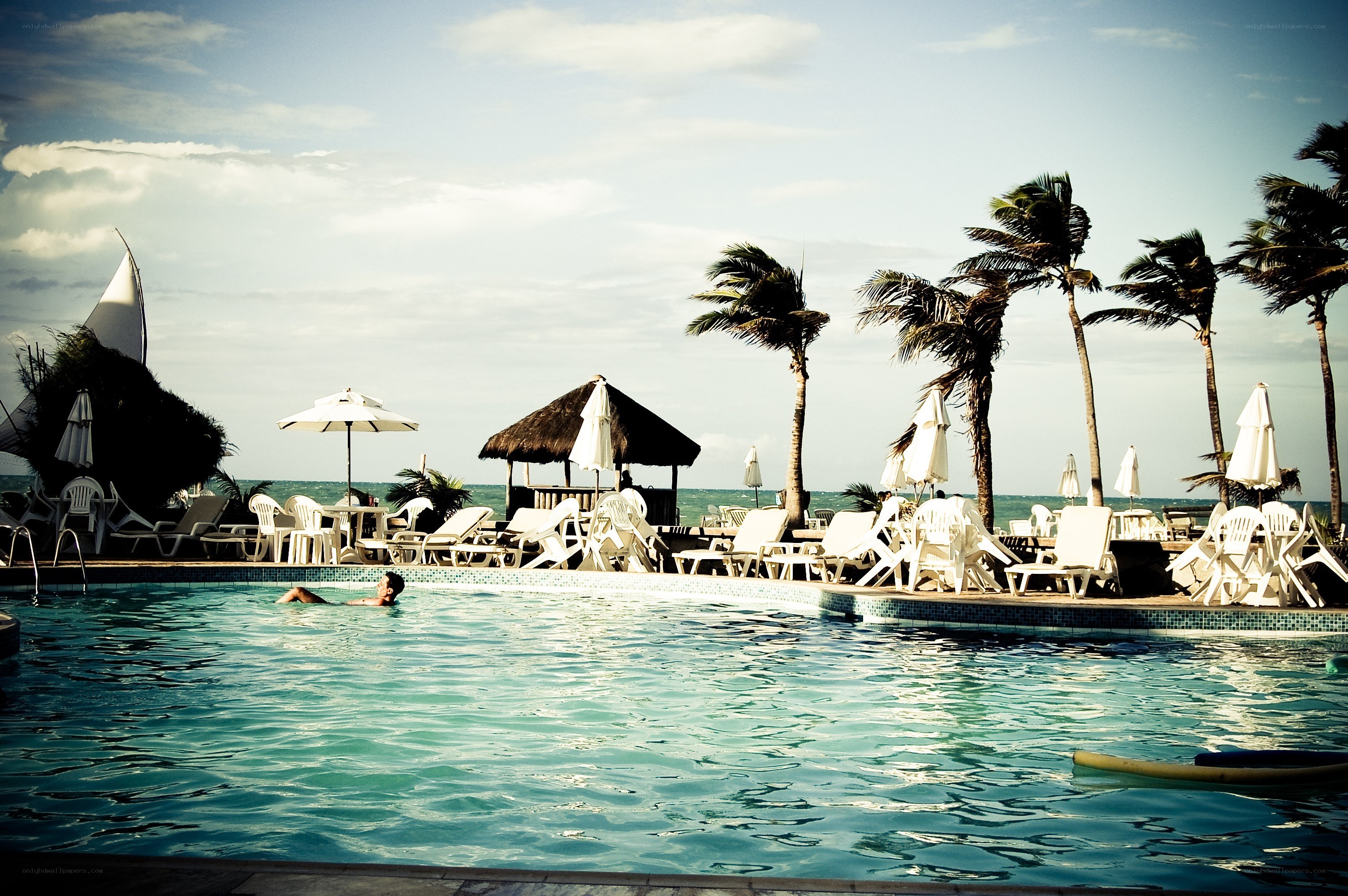 Poolside resort with ocean view