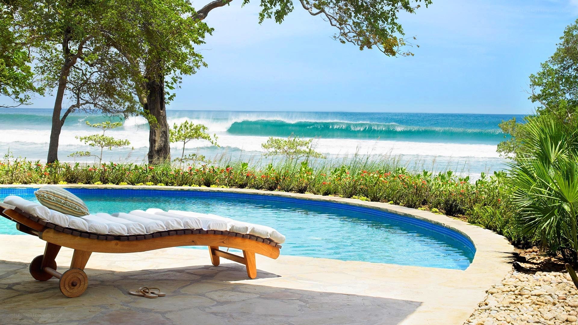 Poolside view of ocean waves