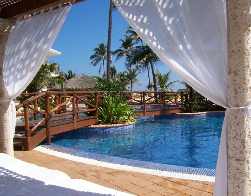 Poolside view with palm trees