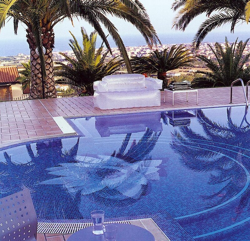 Poolside with city view