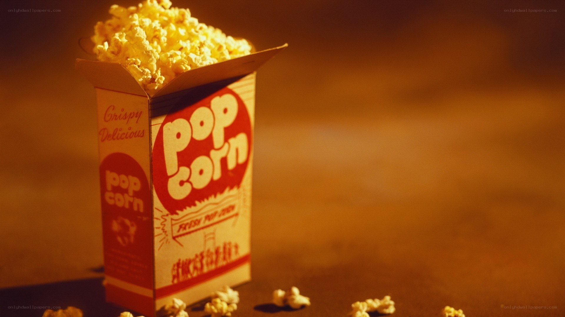 Popcorn box with spilled kernels