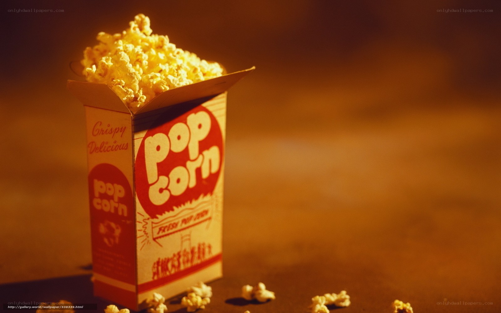 Popcorn box with spilled kernels