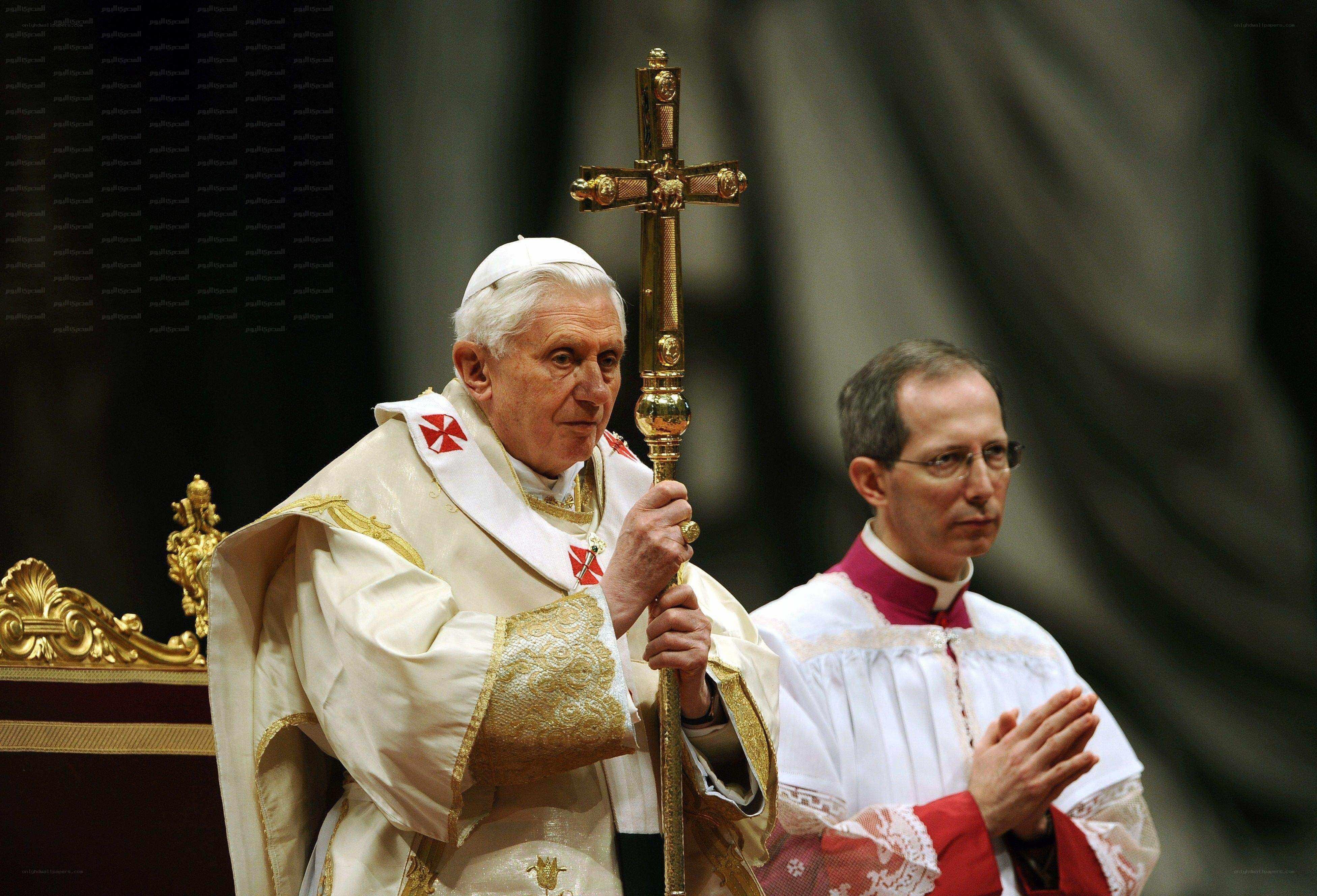 Pope holding a staff