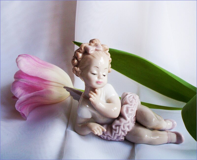 Porcelain Cherub Figurine