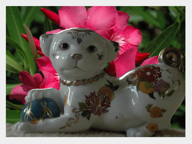 porcelain dog figurine with flowers