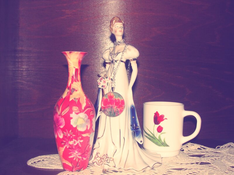 Porcelain Figurine with Vase and Mug