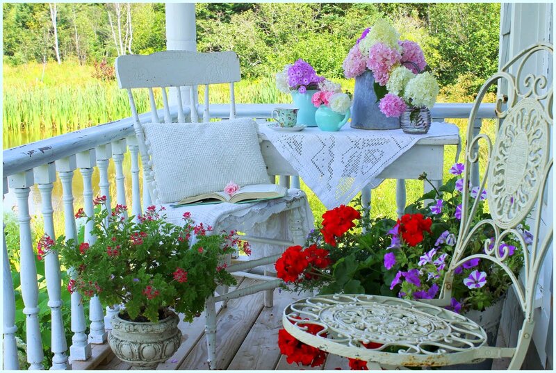 Porch with Flowers and Chairs