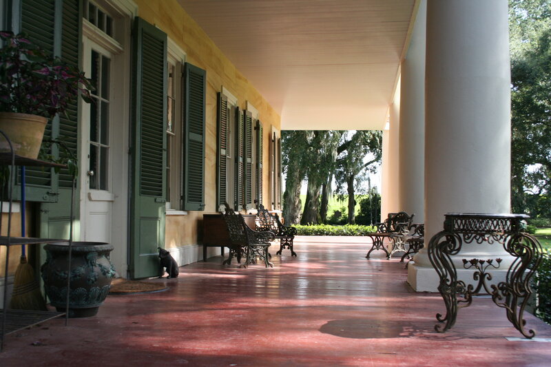 Porch with green shutters