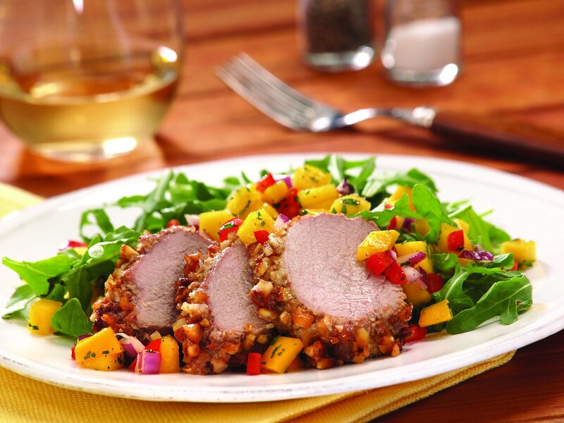 Pork with mango salsa salad