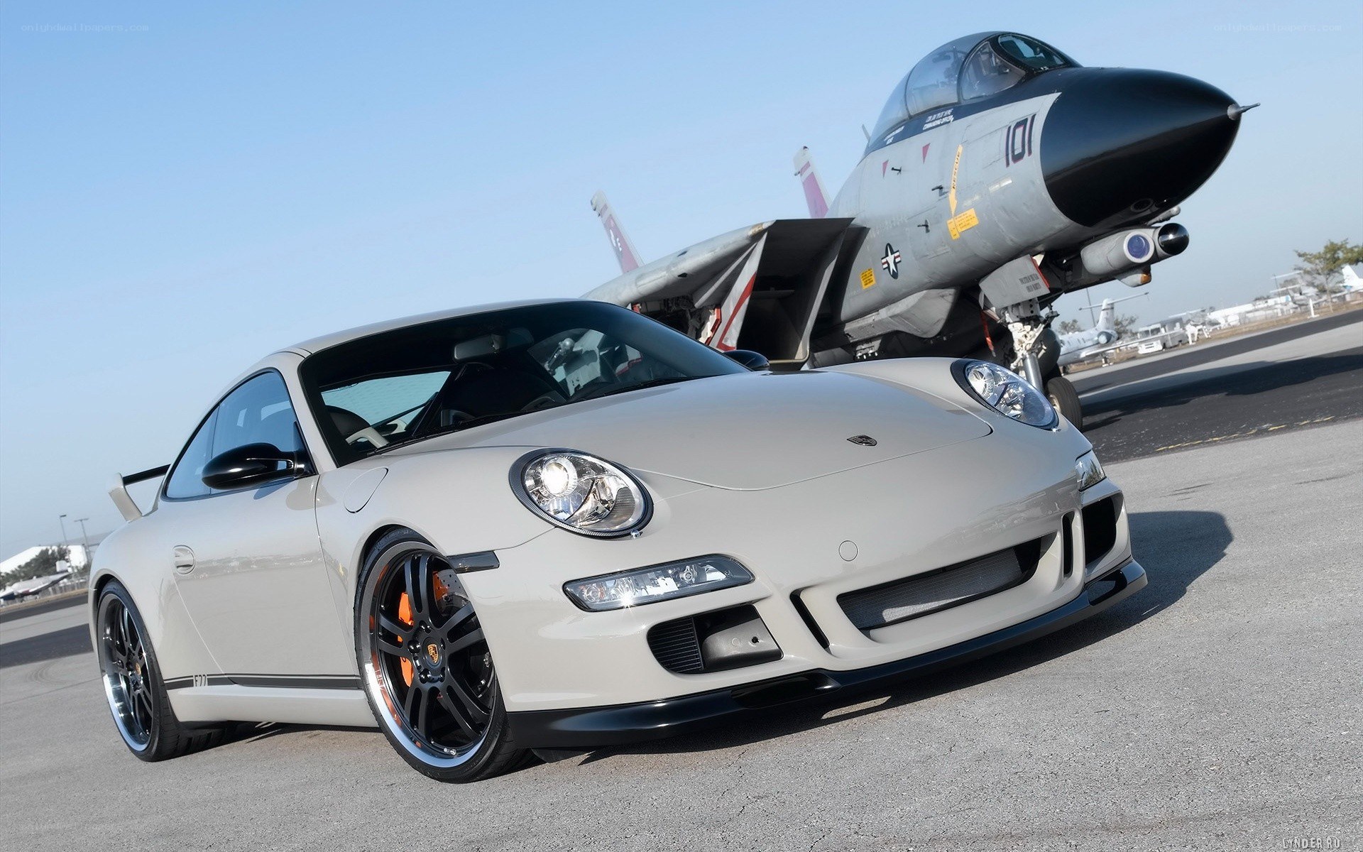 Porsche 911 and fighter jet