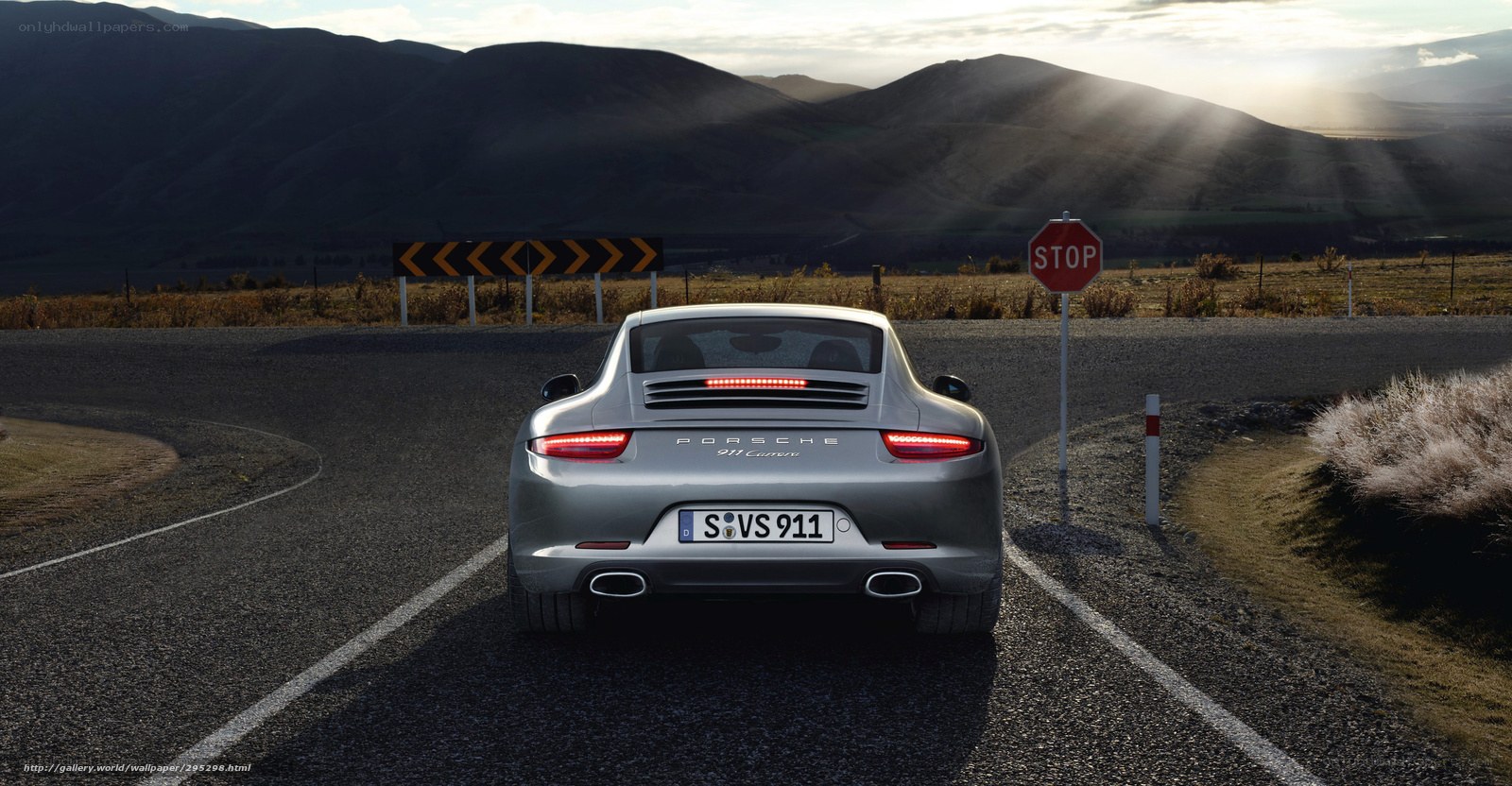 Porsche 911 Carrera on a winding road