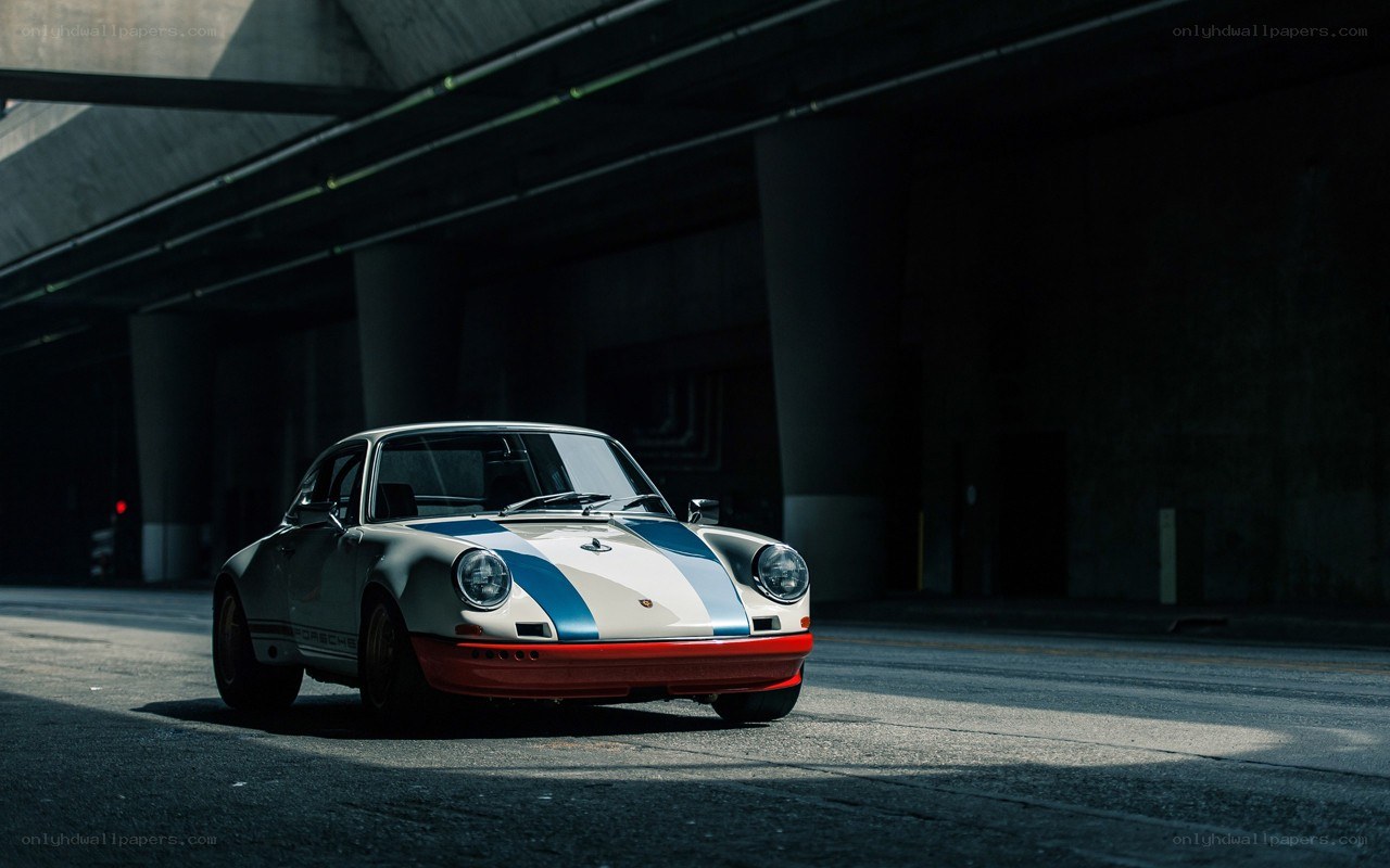 Porsche 911 under an overpass