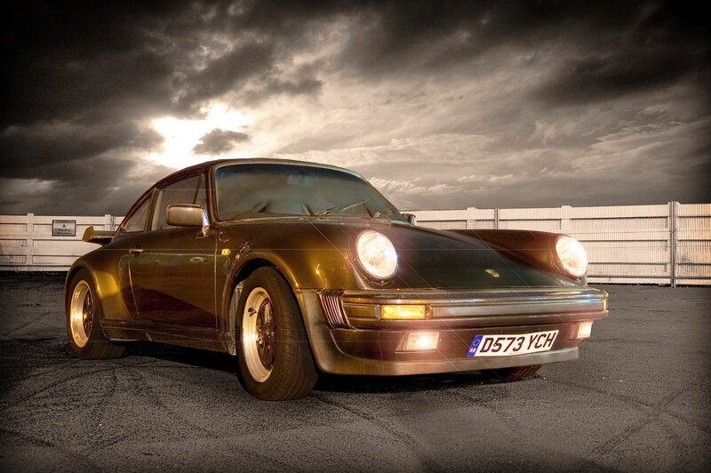 Porsche 911 under dramatic sky