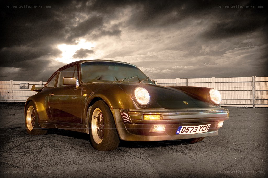 Porsche 911 under dramatic sky