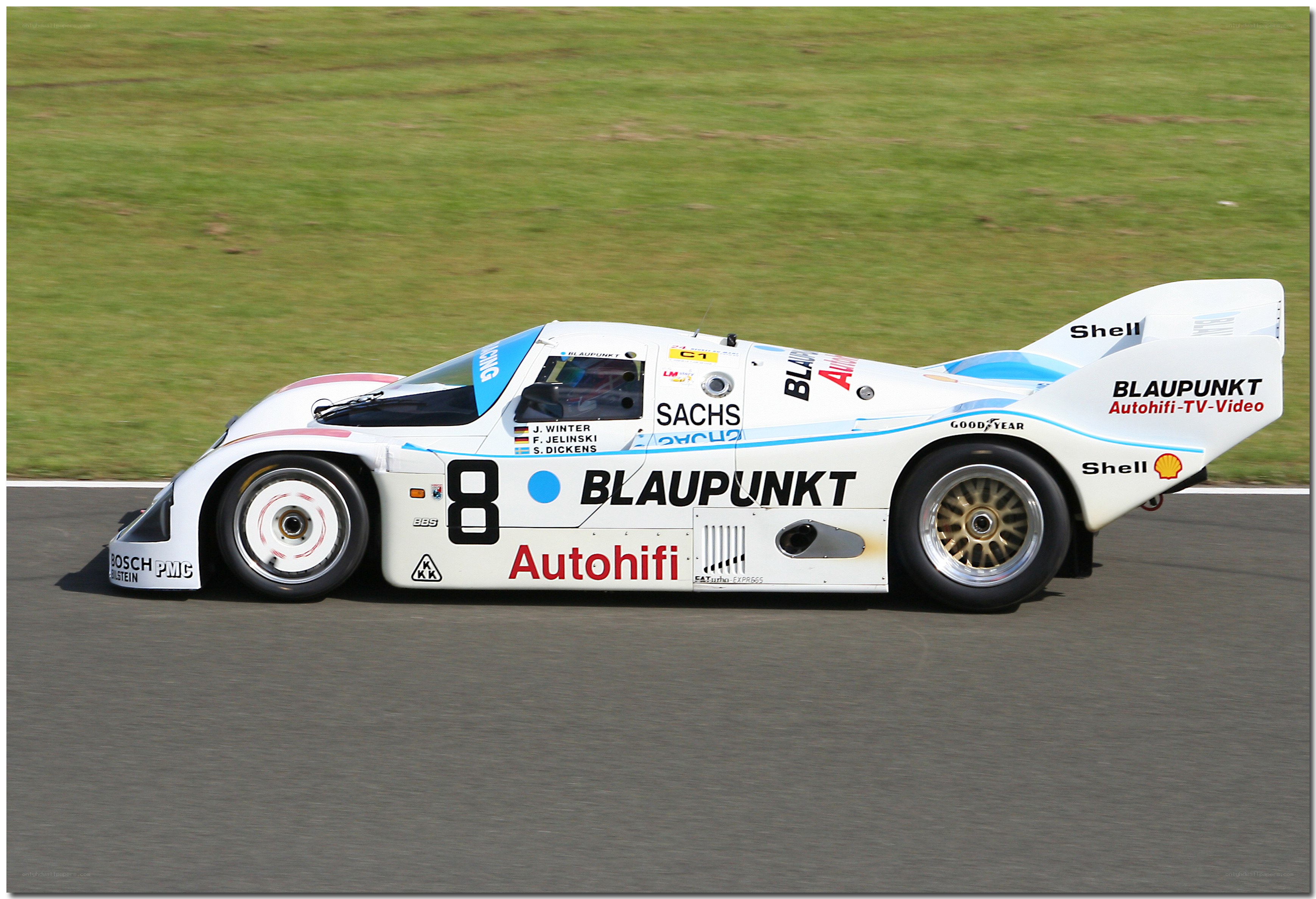 Porsche 962 race car on track