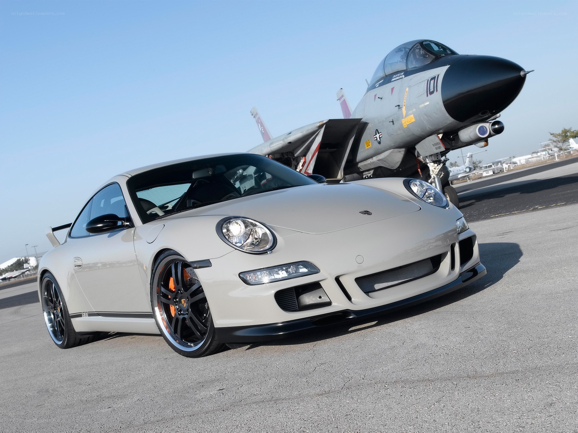 Porsche and fighter jet