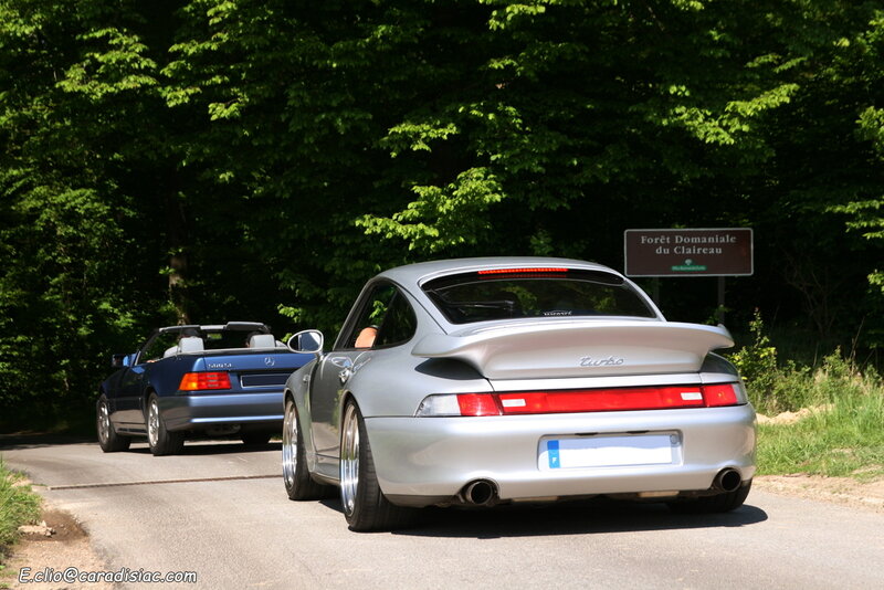 Porsche and Mercedes on a forest road