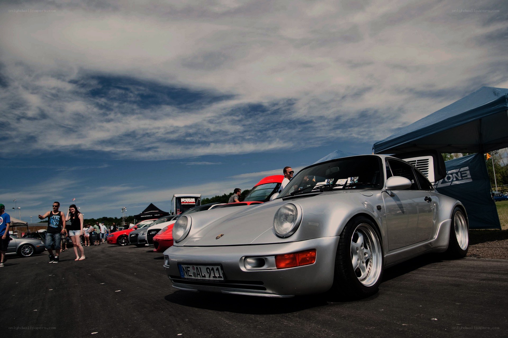 Porsche at a car show