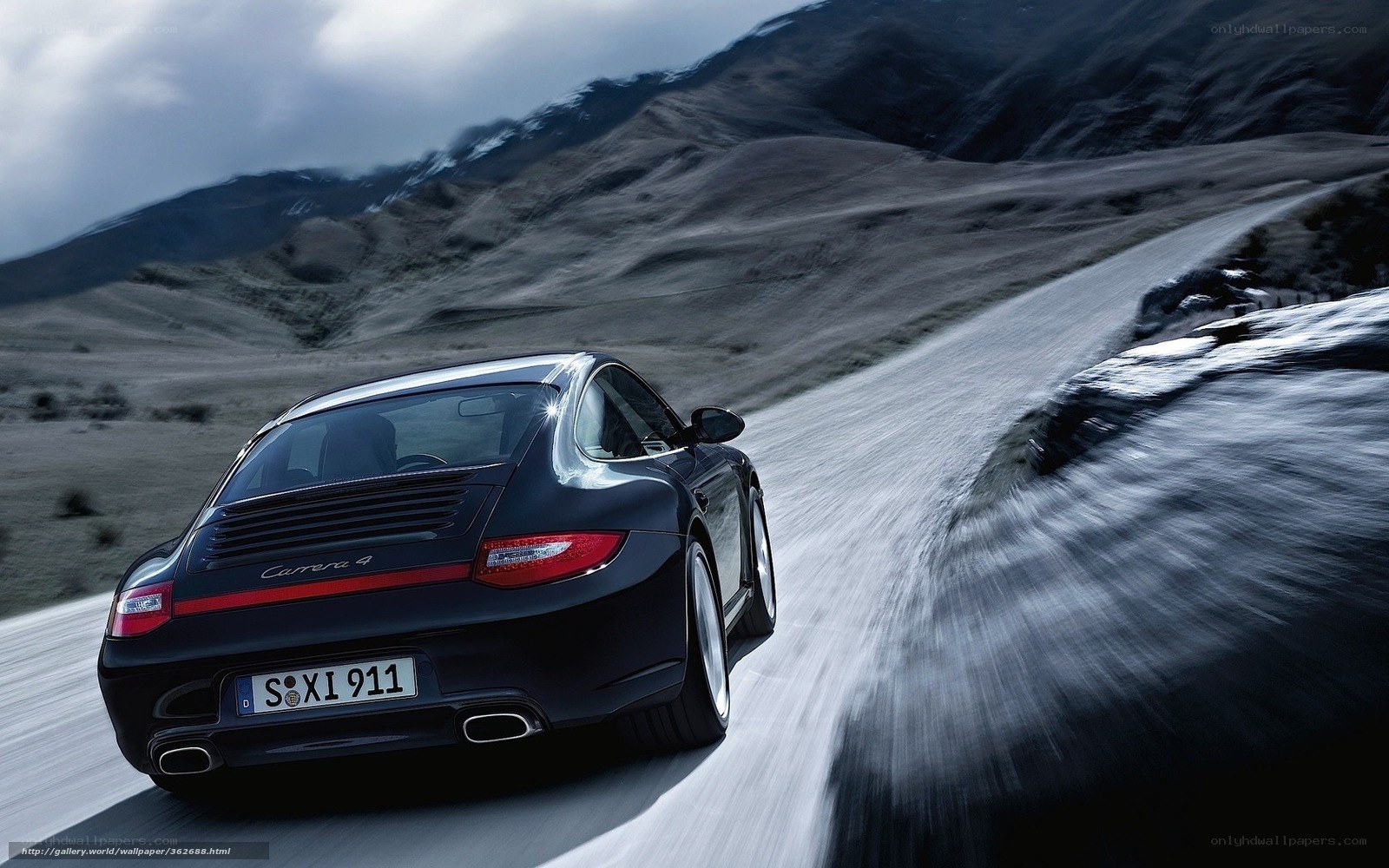 Porsche Carrera 4 on mountain road