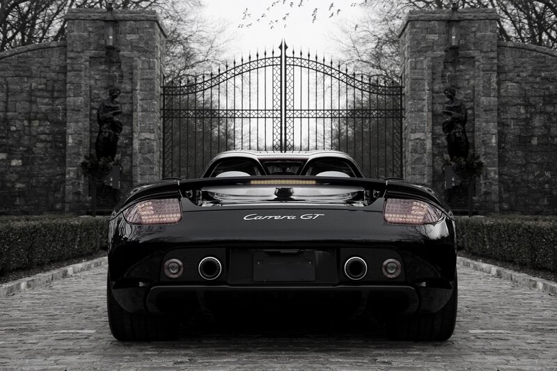 Porsche Carrera GT at stone gate