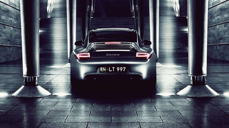 Porsche Carrera in a modern garage