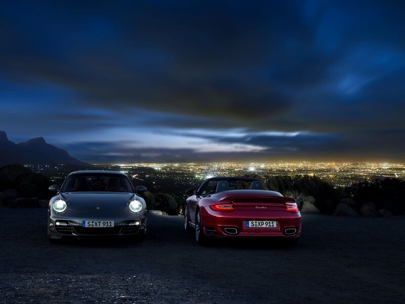 Porsche cars at night