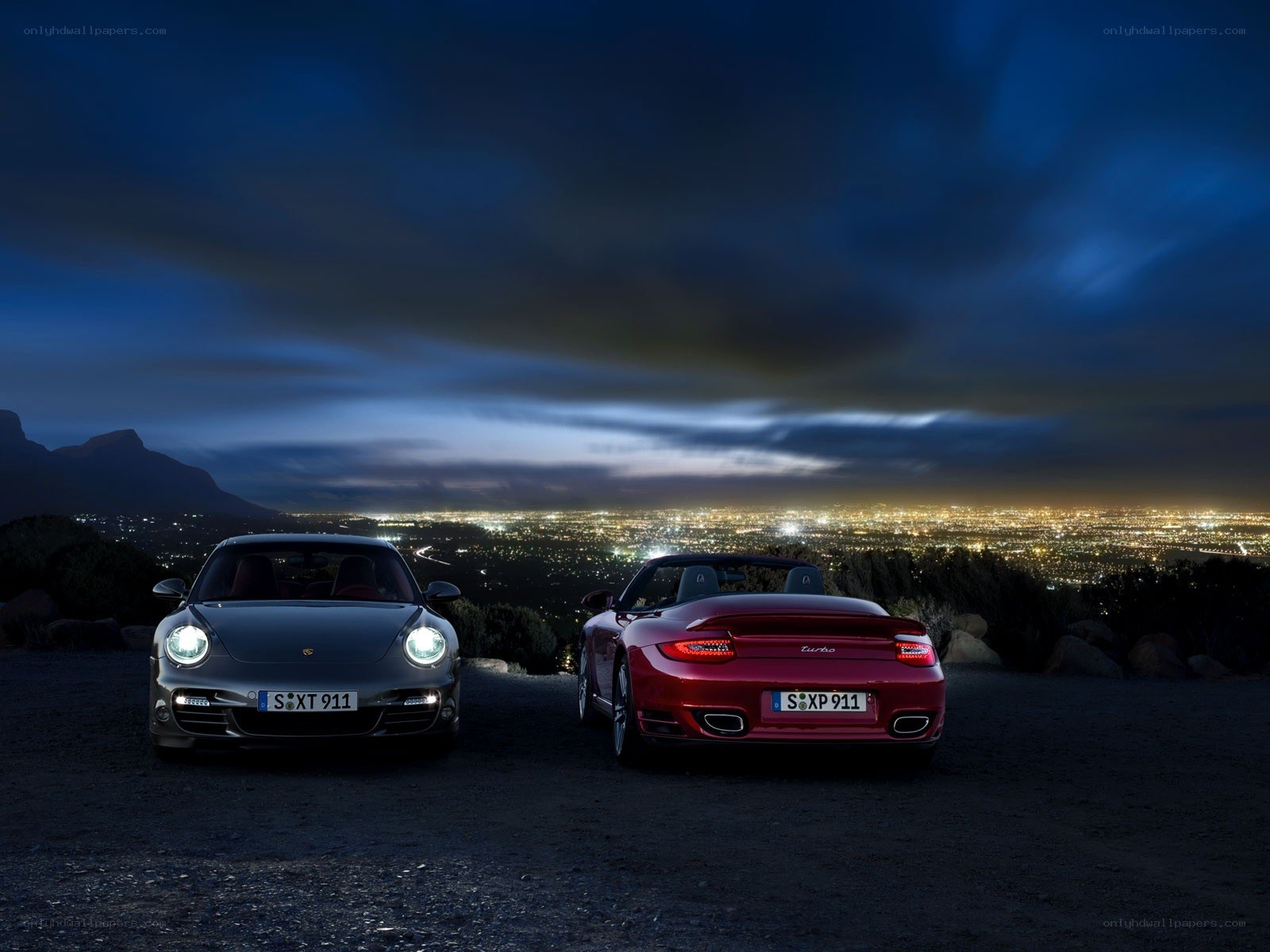 Porsche cars at night