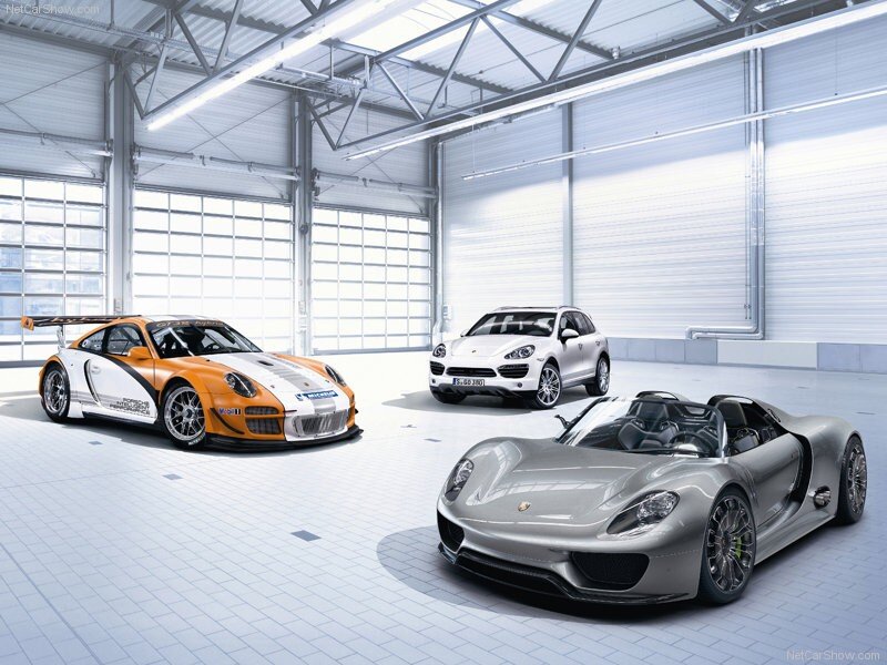 Porsche cars in a garage